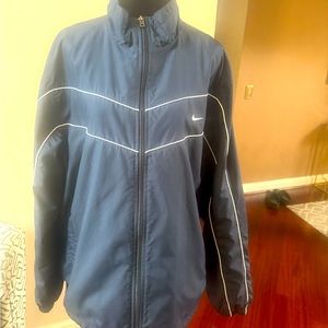 Nike navy blue zip up fleece jacket, insulated,excellent condition